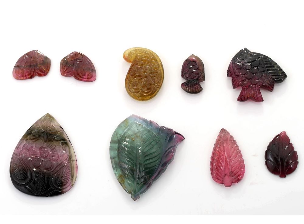 Gemstone carving examples : hand carved multicoloured tourmalines.